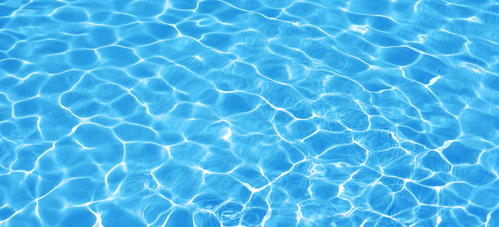 Water background, ripple and flow with waves. Summer blue swiming pool pattern. Sea, ocean surface. Overhead top view with place for text. Panoramic banner