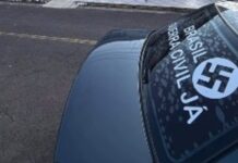 Veículo com símbolo nazista e mensagem de incitação à violência mobiliza forças de segurança